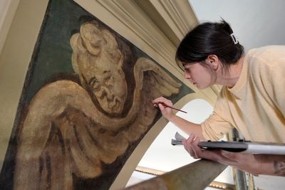 Centuries-old angels uncovered at Boston church made famous by Paul Revere