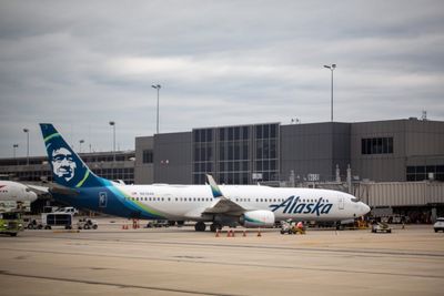 Alaska Airlines passenger opens emergency exit and climbs onto wing because she was ‘anxious’