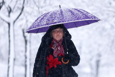 Balkans snowstorm leaves tens of thousands of homes without power, causes traffic chaos