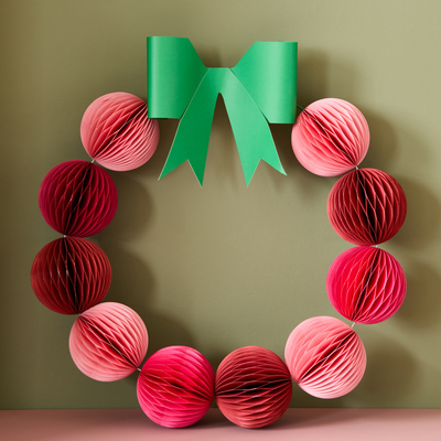 How to turn wrapping paper into bows for last-minute New Year's Eve decorations in 2 simple steps