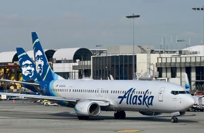 Nervous Flyer Loses It While Waiting to Get Off Plane, Opens Emergency Exit and Runs Out Onto Wing