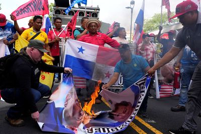 Protestors Burn US Flag Following Trump's Threats to Retake Control of Panama Canal: 'F*** Trump'