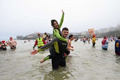 Romantic proposal makes waves at Tenby Boxing Day swim