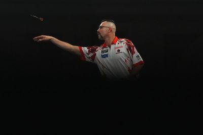 Damon Heta lands nine-darter before shock defeat at World Darts Championship