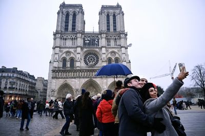 Tourists Return To Post-Olympic Paris For Holiday Magic