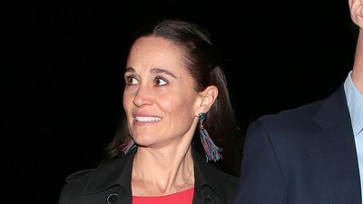 Pippa Middleton's chic red jumpsuit, matching heels and tailored coat is the sophisticated take on party wear we're loving for New Year's Eve