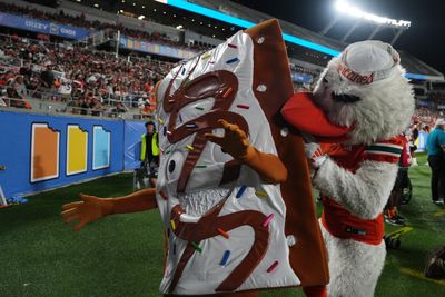 The Miami mascot rudely tried to eat one of the Pop-Tarts Bowl mascots