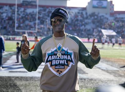 5 Snoop Dogg highlights from the Arizona Bowl, including him leading the marching bands