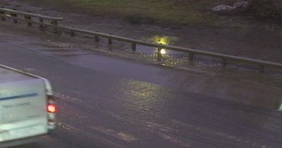 Part of M8 closed due to 'sewage' flooding carriageway