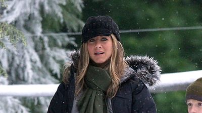 Feeling the winter chill? Jennifer Aniston knows how to keep warm in style with her practical snow boots and oversized coat