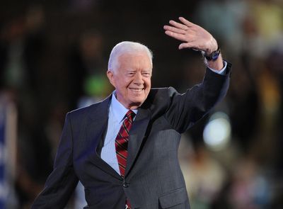 Jimmy Carter: King and PM honour former US president after his death aged 100