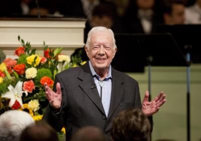 Fans Honor Late President Jimmy Carter At Football Game