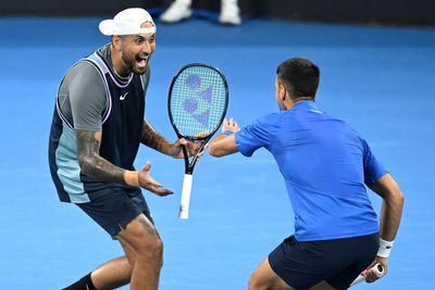 Nick Kyrgios celebrates return from injury with Novak Djokovic doubles victory in Brisbane