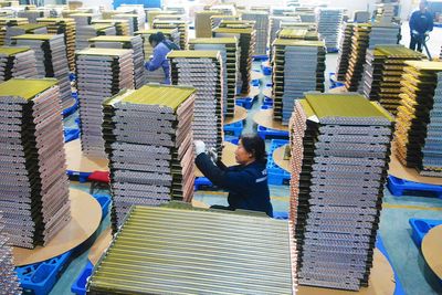 China's manufacturing activity slows in December as trade risks grow