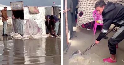 Flooding damages tents of displaced families in Gaza as temperatures plummet