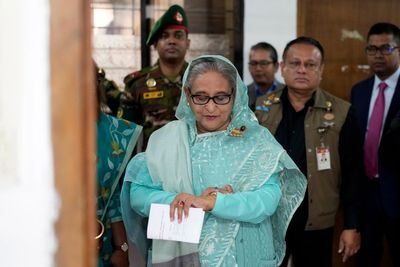 Thousands march in Bangladesh calling for the ousted prime minister's prosecution