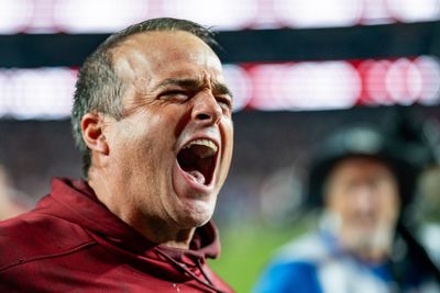 South Carolina coach Shane Beamer goes after Illinois’ Bret Bielema during Cheez-It Bowl