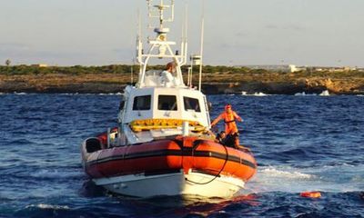 Twenty missing after falling from boat in rough seas off Libya’s coast