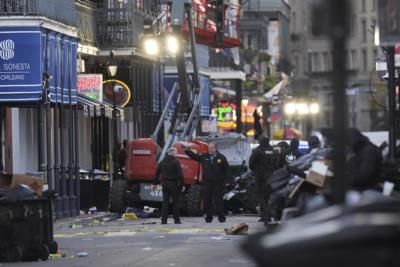 Honoring Victims Of New Orleans Attack And Late President Carter