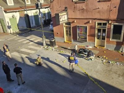 Sanitation Crews Clean Up Bourbon Street After Tragic New Years