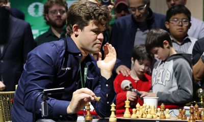 Chess: jeans-clad Carlsen defies critics to share Blitz with Nepomniachtchi