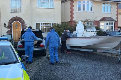 Forensic officers examine boat of elderly couple as police probe their deaths