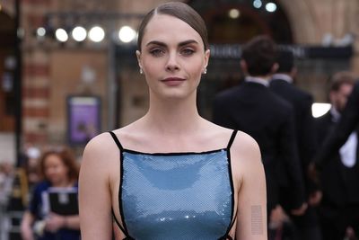 Cara Delevingne baffles fans with photo of huge baby bump