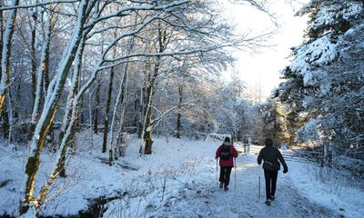 UK braced for snow and freezing rain as temperatures drop as low as -8.6C – live