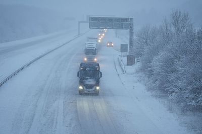 UK weather LIVE: Heavy snow sparks airport runway closures and motorway chaos across the country