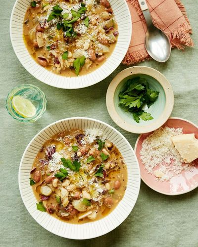 Georgina Hayden’s recipe for brothy braised chicory and beans