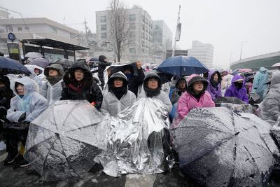 Hundreds of South Koreans brave freezing temperatures to demand impeached President Yoon’s ouster