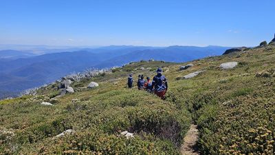 Search resumes for missing bushwalker amid heat, fire