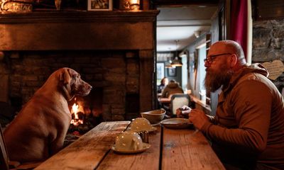 ‘It makes you feel like a kid again’: snowed in at Britain’s highest pub