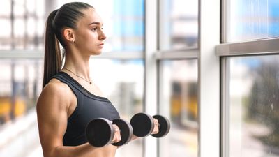 You only need 2 dumbbells and 15 minutes to build full-body muscle with this standing workout