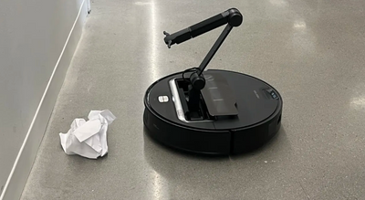 New AI Vacuum: The Robot With An Arm That Picks Up After You