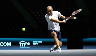 Australian Open: Dan Evans crashes out in qualifying but Harriet Dart and Heather Watson progress