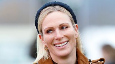 Zara Tindall swaps dreary January for Australian sunshine - her old Hollywood sunhat and wedges are glam getaway accessories