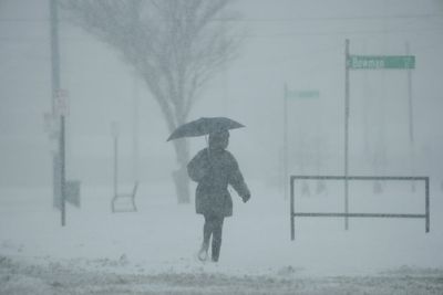 Deadly winter storm sends airports into chaos as more than 245,000 customers left without power