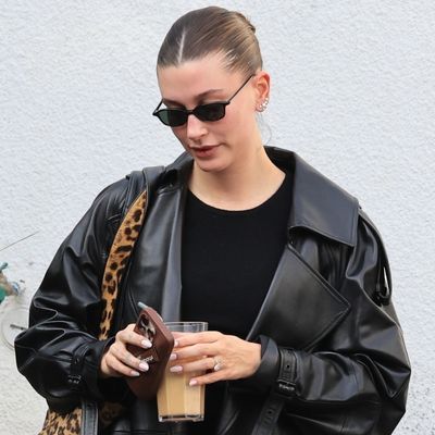 Hailey Bieber Shows Off the Sold-Out Saint Laurent Bag Every Fashion Girl Wants With a Leather Trench and $820 Ballet Flats by The Row