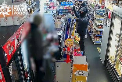 Footage released of shop robbery as police appeal for witnesses