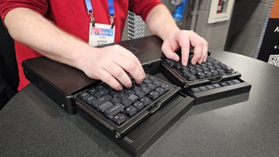 Raspberry Pi 5 powers motorized keyboard that changes layout based on hand gestures