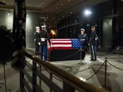 Jimmy Carter's Casket Arrives At Navy Memorial For Ceremony