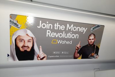 Ads for Islamic investment platform showing burning US and euro banknotes banned