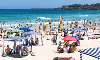 Staking claim to a patch of sand with your beach cabana might be the most Australian thing of all