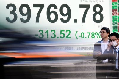 Stock market today: Asian shares slip after Wall St slumps despite strong US economic data