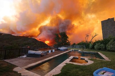 Wildfire Forces Tens of Thousands to Evacuate in L.A.'s Pacific Palisades as Santa Monica Faces Growing Threat