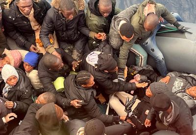 A photo captures rescue of a baby born on dangerous sea crossing to Spain's Canary Islands