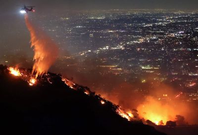 LA wildfires approach Hollywood sign as 180,000 evacuated and celebrity homes destroyed