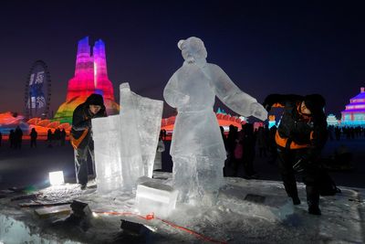 AP PHOTOS: Making art and fun from the ice, snow and freezing cold in Harbin, China