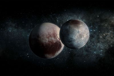 Pluto captured its moon with a kiss